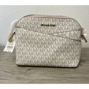 Michael Kors Jet Set Travel Medium Logo Dome Crossbody Bag in a vanilla/white